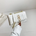 White quilted shoulder bag with gold SS logo, tassel detail and elegant chain strap - White