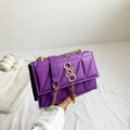 Chic purple quilted crossbody bag with golden chain strap and tassel detail - Purple