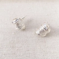 Modern silver earrings with irregular pleated leaf design on linen background - Large / Silver