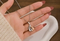 Collana con ciondolo cane e donna in argento e oro rosa su catenina d'acciaio - Collana (Argento + Oro Rosa)