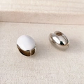 Minimalist silver oval earrings with white enamel inlay and polished metal finish - Cream