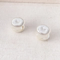 French vintage silver hoop earrings with radial texture on a linen background - Silver