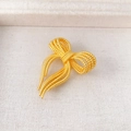 Elegante spilla a fiocco dorata con trama a perline per maglioni e cappotti - Oro