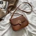 Minimalist caramel brown PU leather crossbody bag with oval gold metal buckle - Brown