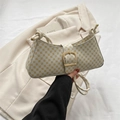 Beigefarbene Schultertasche mit gelbem Blumenmuster und goldener Metallschnalle - Weiß