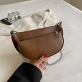 Brown semi-circle crescent saddle bag with silver chain strap and front zipper pocket - Brown