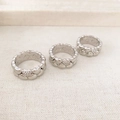 Three stacked silver-colored heart rings with sparkling crystals and polished finish - US 6 / White Gold