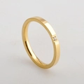 Minimalist gold titanium steel ring with a single sparkling cubic zirconia stone - US 5 / Gold