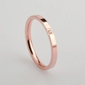 Minimalist rose gold titanium ring featuring a single sparkling zircon for a modern look - US 5 / Rose Gold