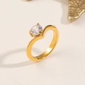 Elegant gold titanium steel ring featuring a sparkling single round-cut solitaire stone - US 5 / Gold
