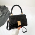 Elegant black crocodile pattern handbag with gold clasp and woven handle for women - Black
