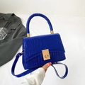 Glossy bright blue crocodile pattern handbag with woven handle and gold hardware - Blue