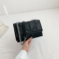 Classic black quilted shoulder bag with silver chain strap and geometric stitching - Black
