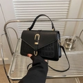 Chic black crocodile pattern crossbody bag with golden buckle and top handle - Black