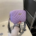 Purple quilted crossbody camera bag with adjustable wide strap and gold hardware - Purple