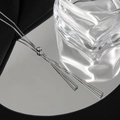 Macro shot of silver triangle pendant necklace with adjustable box chain on mirror - Standard Triangle Adjustable Style-Silver (FX118)