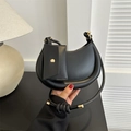 Minimalist black crescent shoulder bag with matching accessory pouch and round handle - Black