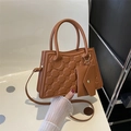 Brown women's quilted crossbody bag with top handles and mini envelope coin purse - Brown
