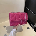 Magenta quilted crossbody bag with silver chain strap and geometric stitching design - Rose Red