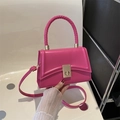 Elegant rose red square handbag with woven handle and metallic twist lock clasp - Rose Pink