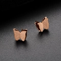 Macro detail of rose gold butterfly earrings with matte and polished layered wings - Rose Gold