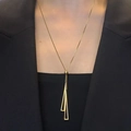 Minimalist geometric gold sweater necklace with triangle pendant tassels on black blazer - Long Triangle Adjustable Style-Gold (FX259)