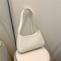 Minimalist off-white crescent underarm shoulder bag in smooth matte faux leather finish - White