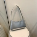 Chic silver underarm bag with metallic finish and minimalist shoulder strap design - Silver