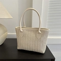 Chic cream straw tote bag with woven herringbone texture and smooth leather handles - Off White