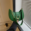 Minimalist green crescent shoulder bag featuring a gold D-buckle and chunky chain strap - Green