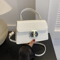 White faux leather crossbody bag with crocodile pattern and golden metal lock - White