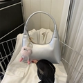 Chic silver underarm bag in metallic PU leather with a cute pink plush charm accessory - Silver