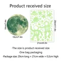 Stickers muraux phosphorescents astronaute et planètes avec lune de 19 cm - 21*29cm*1 Feuille + 19*19cm*1 Feuille