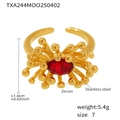 Macro detail of 18K gold plated stainless steel ring with red oval zircon center stone - US 7 / Ring / Red