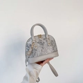 Elegante borsa a mano a conchiglia bianco off-white con dettagli in pelle grigia - Grigio