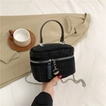 Sparkly black rhinestone box bag with chain strap and handle in a fashion setting - Black