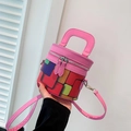 Borsa a cilindro geometrica colorata con manici rosa e tracolla staccabile - Rosa