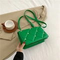 Chic lime green quilted crossbody bag with metallic silver rivets and adjustable strap - Green