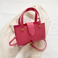 Bolso tote magenta en cuero granulado con asas dobles y herrajes metálicos dorados - rosa intenso