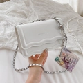 White wave-edge crossbody bag with silver metal chain and spherical charm detail - Off White