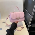 Chic light pink crossbody bag with a round gold buckle and a fine shoulder strap - Pink