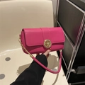 Fashionable rose red crossbody bag with golden mandala lock and chain strap - Rose Red