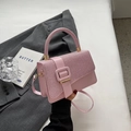 Pink top-handle bag with shimmering textured flap and smooth faux leather finish - Pink
