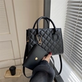 Quilted black tote bag with small pouch, gold chain straps and adjustable shoulder handle - Black