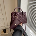 Elegant burgundy quilted handbag with matching small pouch charm and gold chain - Burgundy