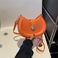 Orange faux leather crescent saddle bag with gold magnetic buckle and shoulder strap - Orange