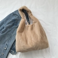 Large apricot plush tote bag in faux rabbit fur with denim jacket on white background - Khaki