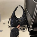 Elegant black quilted handbag with diamond pattern and adjustable gold chain strap - Black
