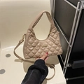 Quilted diamond pattern handbag in beige featuring adjustable strap and metallic logo plate - Khaki