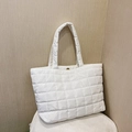 White quilted puffer tote bag with large capacity and elegant minimalist shoulder design - White